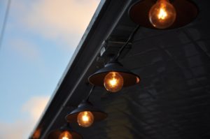 photo of lightbulbs along a roof