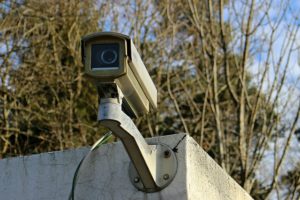 photo of a cctv camera on a wall
